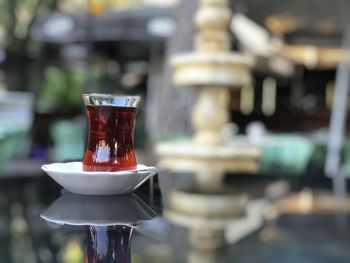 Close-up of tea in glass on table