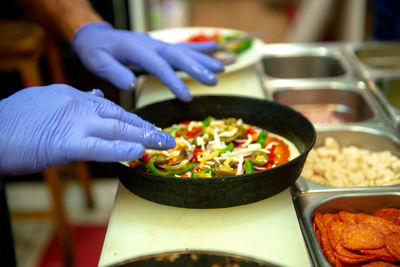 Close-up of person preparing food