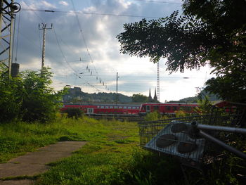 Train on field against sky