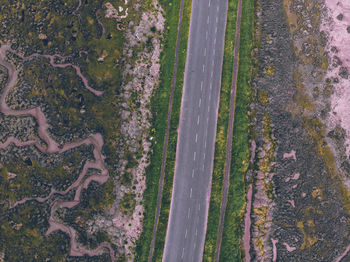 High angle view of road amidst field