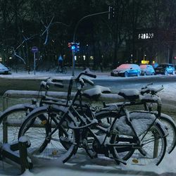 Cars parked in snow covered landscape