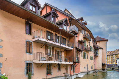 Historic houses along the thiou river in annecy old town, france