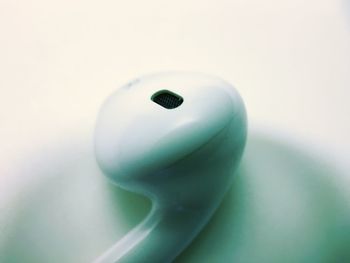 Close-up of white object on wall