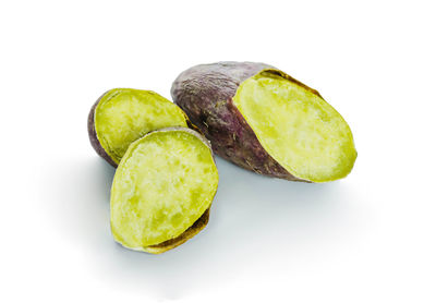 Close-up of fruit against white background