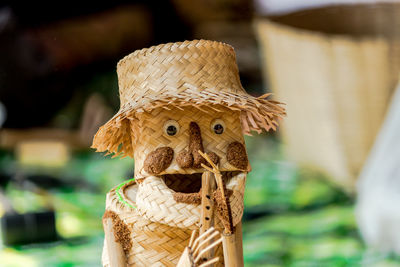 Close-up of scarecrow made from wicker