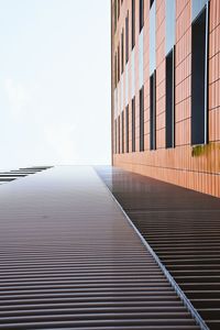 Low angle view of modern building against clear sky