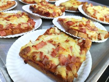 High angle view of pizza break on plate