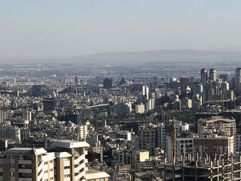 High angle view of buildings against sky in city