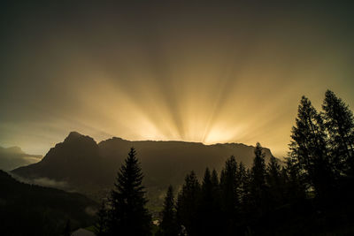 Scenic view of mountains against sky during sunset