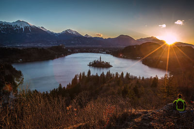 Scenic view of mountains against sky at sunset