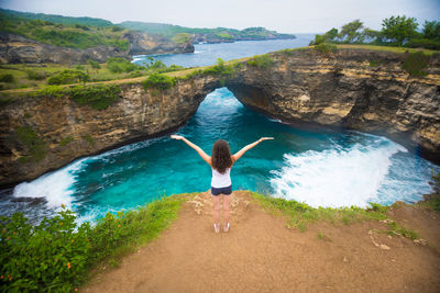 High angle view of woman standing in water