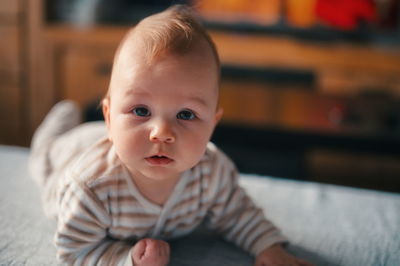 Portrait of cute baby at home