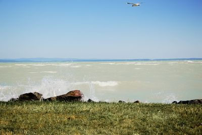 Scenic view of sea against clear sky