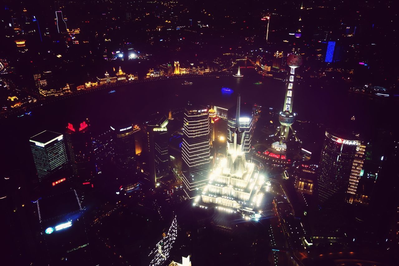 night, illuminated, building exterior, city, architecture, skyscraper, built structure, cityscape, tall - high, tower, office building, modern, crowded, financial district, high angle view, city life, capital cities, no people, residential building, building