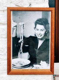 Portrait of smiling woman at home