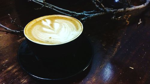 High angle view of cappuccino on table