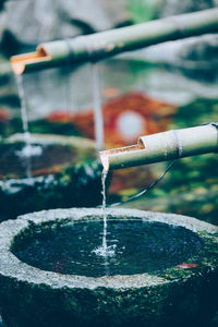 Water falling from shishi-odoshi