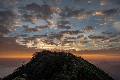 Scenic view of mountain against sky during sunset