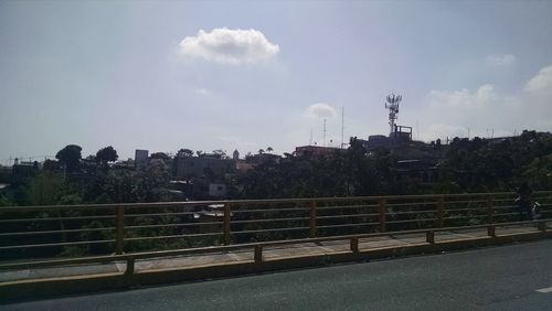 Factory against sky in city