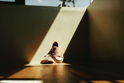 Shoes on hardwood floor at home