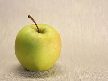 High angle view of apple on table