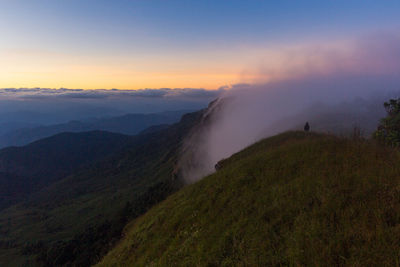 Scenic view of landscape against sky during sunset