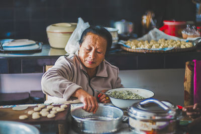 Young man preparing food