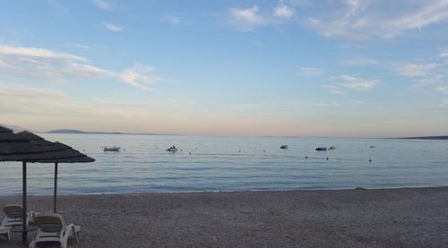 Scenic view of sea at sunset