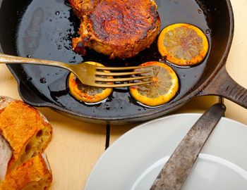 High angle view of bread in plate on table