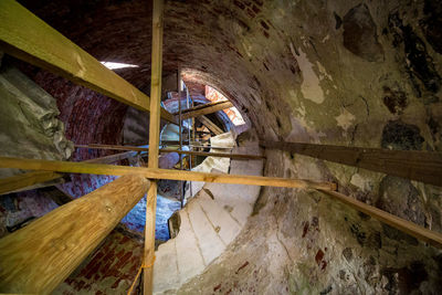 High angle view of man standing on staircase