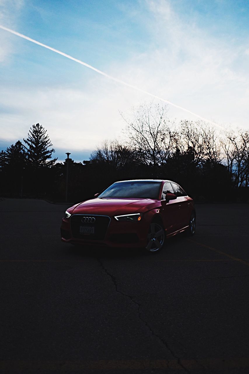 car, transportation, sunlight, outdoors, no people, sky, day