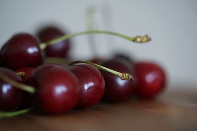 Close-up of cherries on table