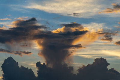 Low angle view of dramatic sky during sunset