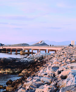 Bridge over sea against sky