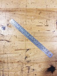 High angle view of ruler on table