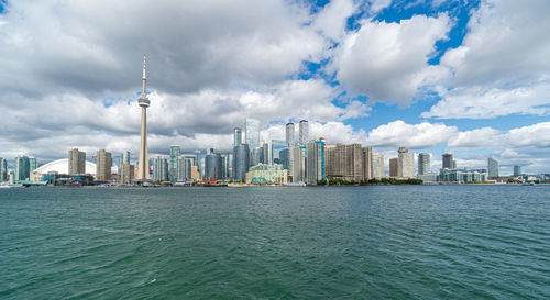 View of buildings against cloudy sky