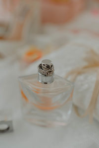 Close-up of wedding rings on table