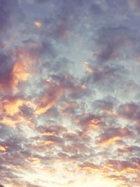 Low angle view of dramatic sky during sunset