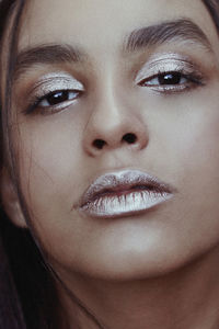 Close-up portrait of young woman