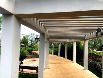 View of colonnade and building in park