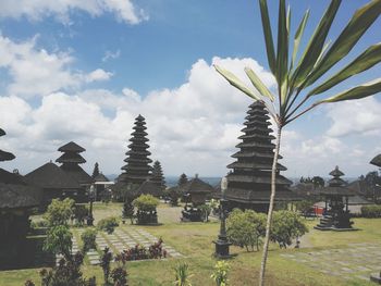 Panoramic view of temple and building against sky