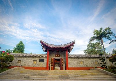 Exterior of historic temple against sky