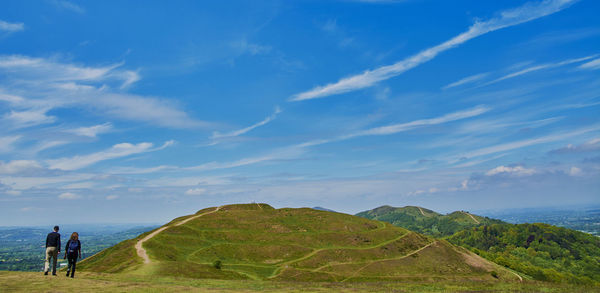 Rear view of a person standing on landscape