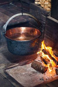 High angle view of bowl by campfire