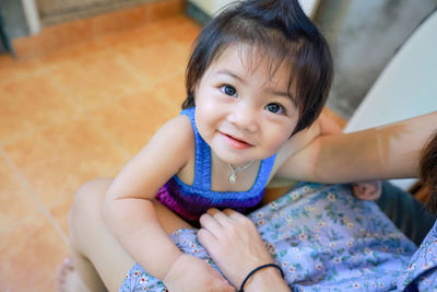 Portrait of a smiling girl sitting