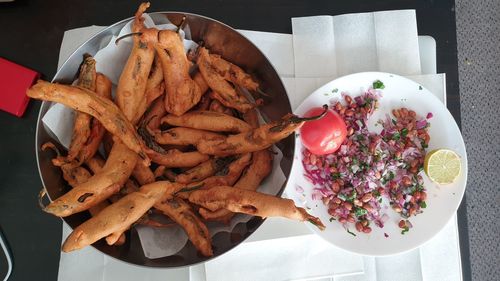 High angle view of vegetables in plate on table