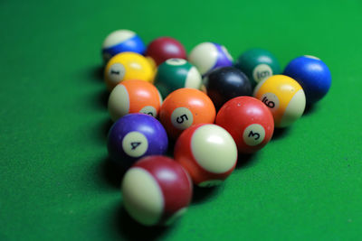 Close-up of colorful pool balls on table