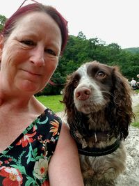 Portrait of woman with dog