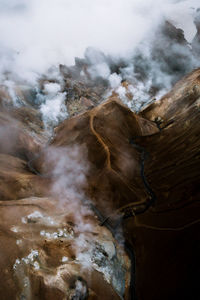 Smoke emitting from volcanic mountain
