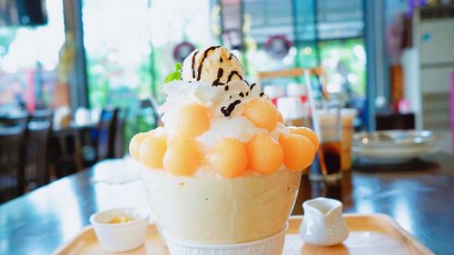 Close-up of ice cream on table